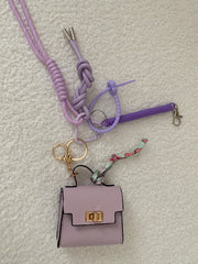 Taschi Anhänger lila